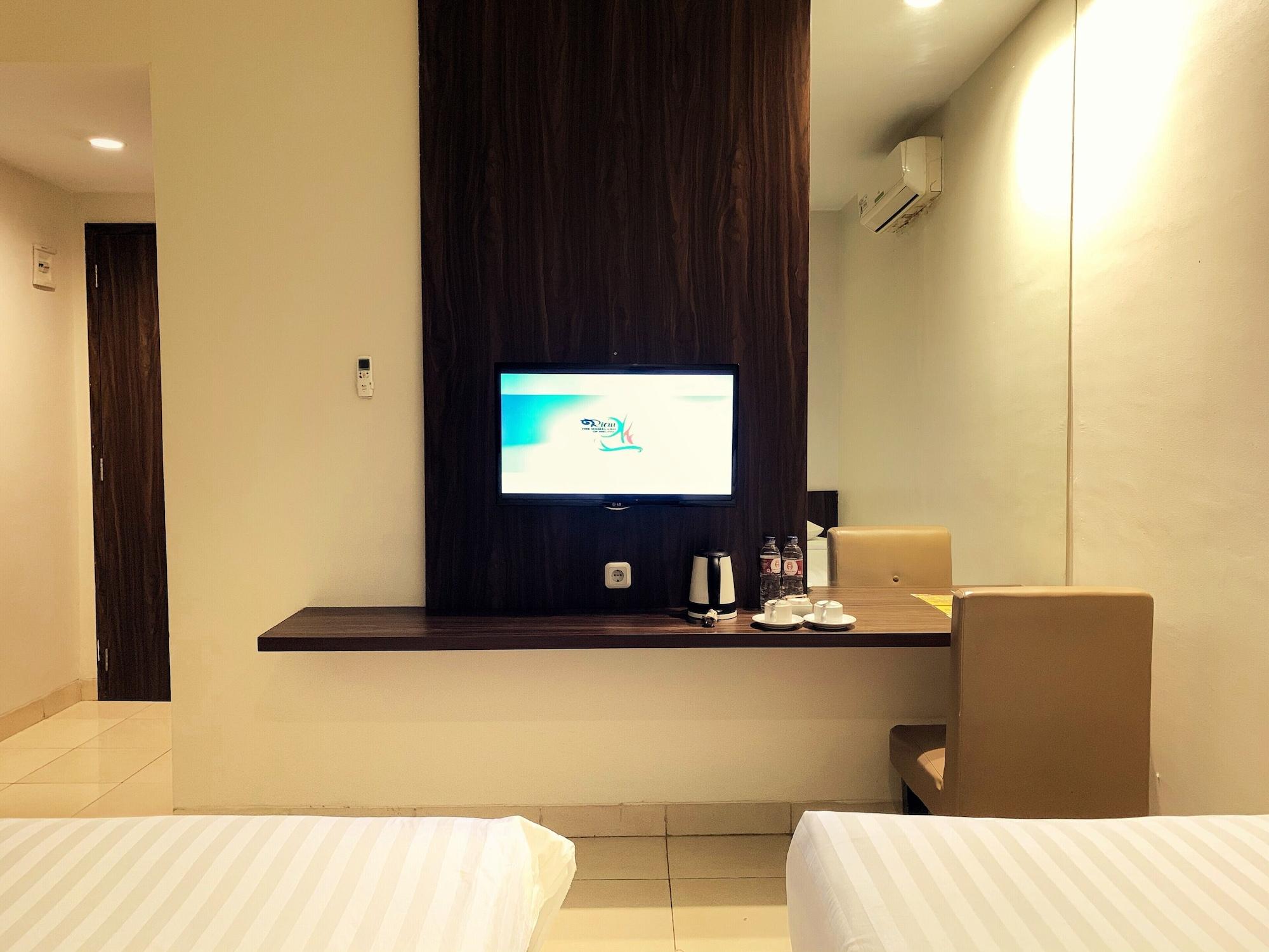 Ameera Hotel Пеканбару Экстерьер фото